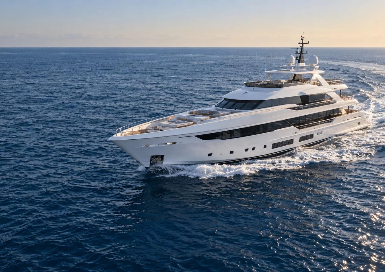 White yacht cruising at sea